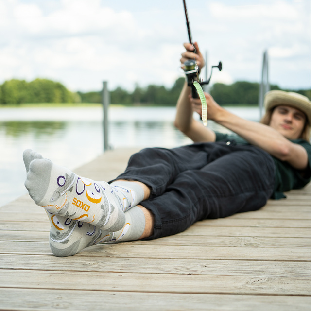 Socken mit Hering-Motiv im Glas