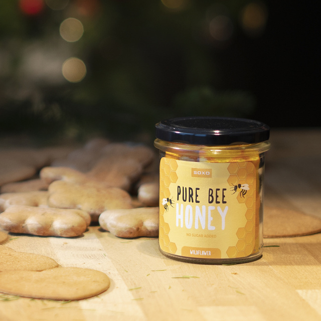 Socken mit Honig-Motiv im Glas