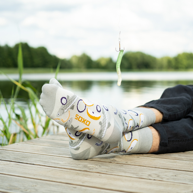 Socken mit Hering-Motiv im Glas